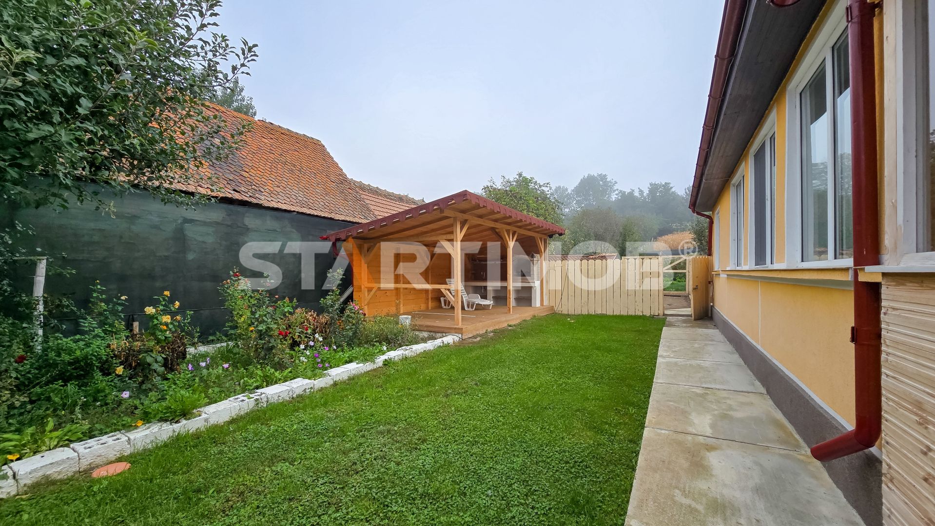 Casa cu teren generos  Haghig