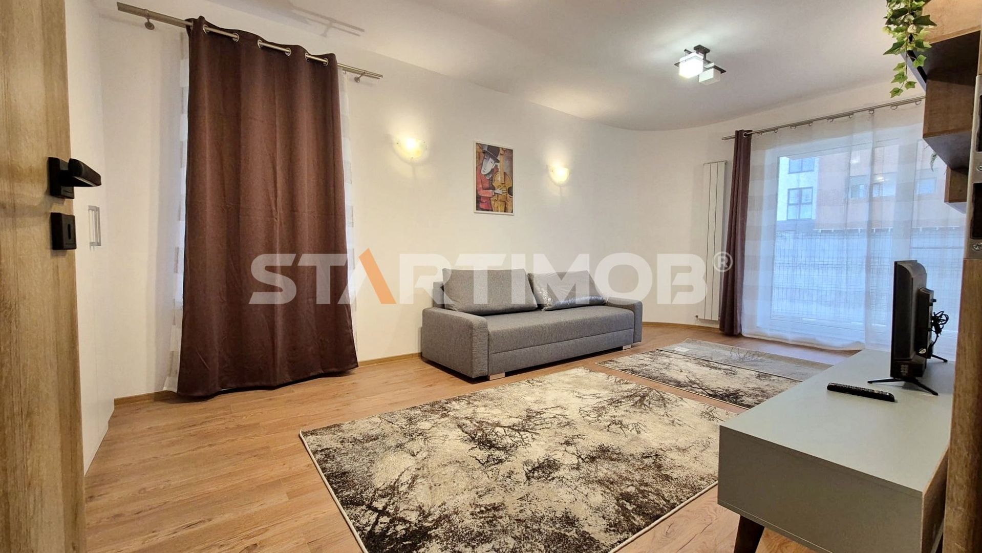 Apartament 2 camere cu parcare si curte proprie